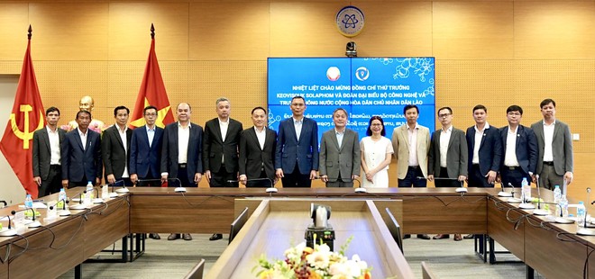 Việt Nam chia sẻ kinh nghiệm chuyển đổi số, AI với Lào- Ảnh 3.