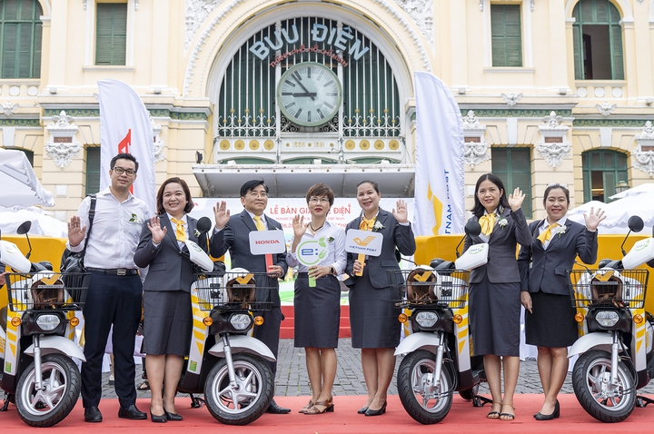 Bưu điện Việt Nam mở rộng triển khai giao hàng bằng xe điện tại TP. Hồ Chí Minh- Ảnh 4.