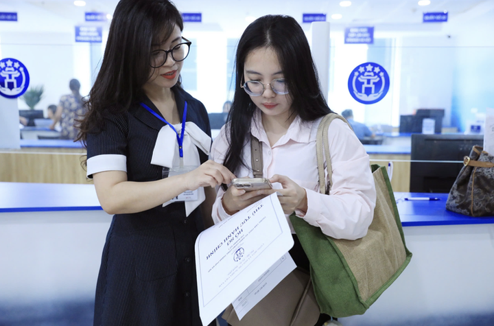 Hà Nội chuyển giao các Điểm phục vụ hành chính công xã, phường về Trung tâm Phục vụ hành chính công thành phố - Ảnh 3.