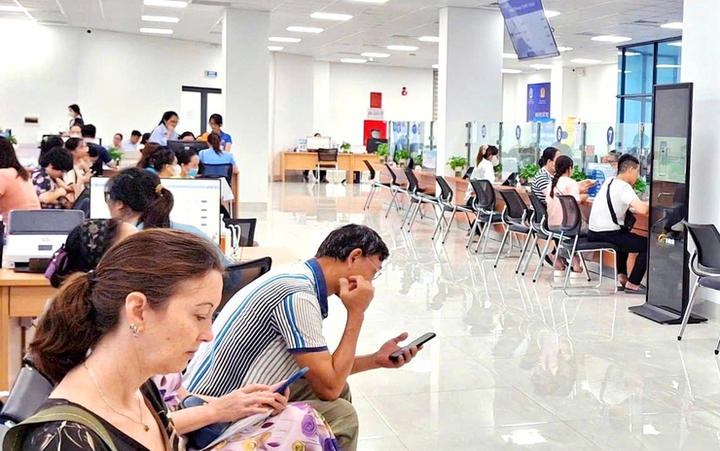 Hà Nội chuyển giao các Điểm phục vụ hành chính công xã, phường về Trung tâm Phục vụ hành chính công thành phố - Ảnh 1.